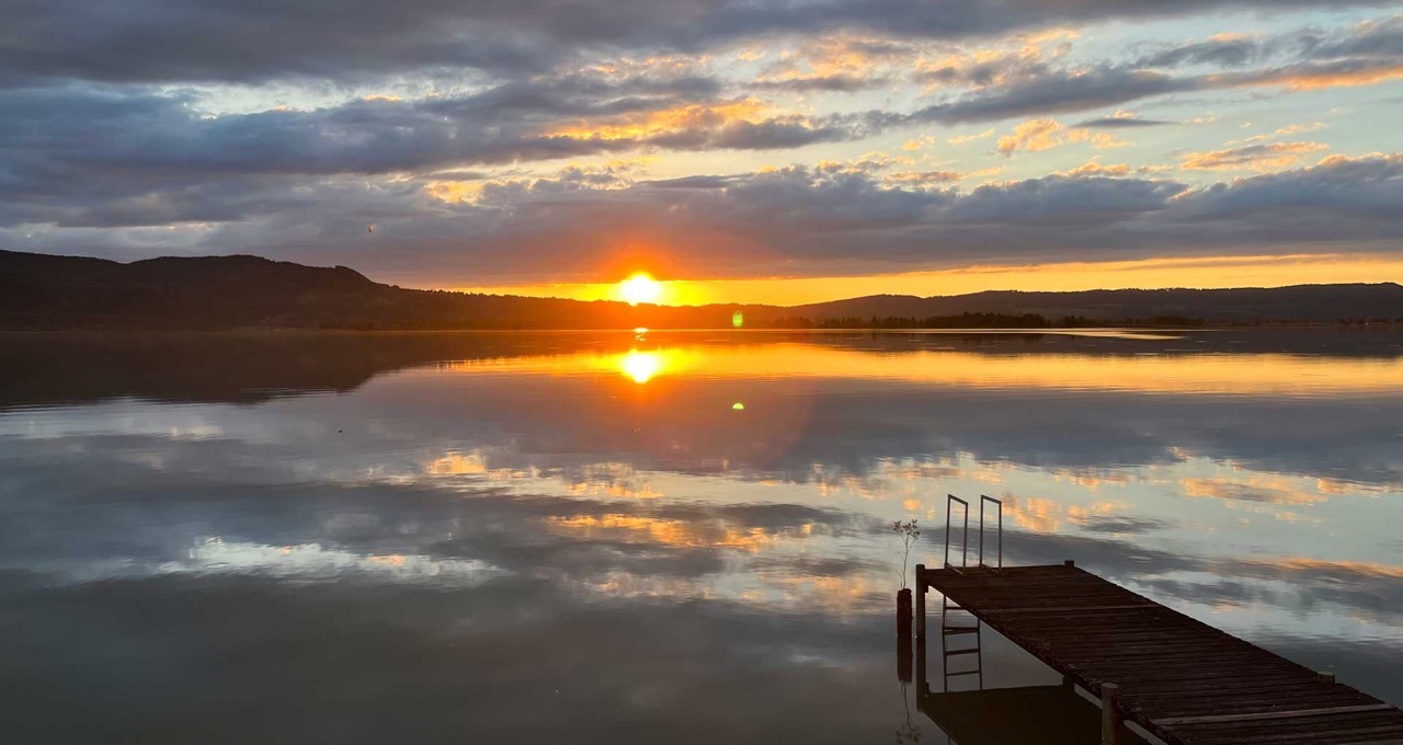 Seehotel Grauer Bär, Sonnenuntergang am Kochelsee